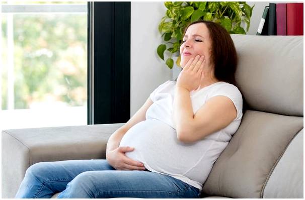 Чувствительные зубы при беременности: как действовать